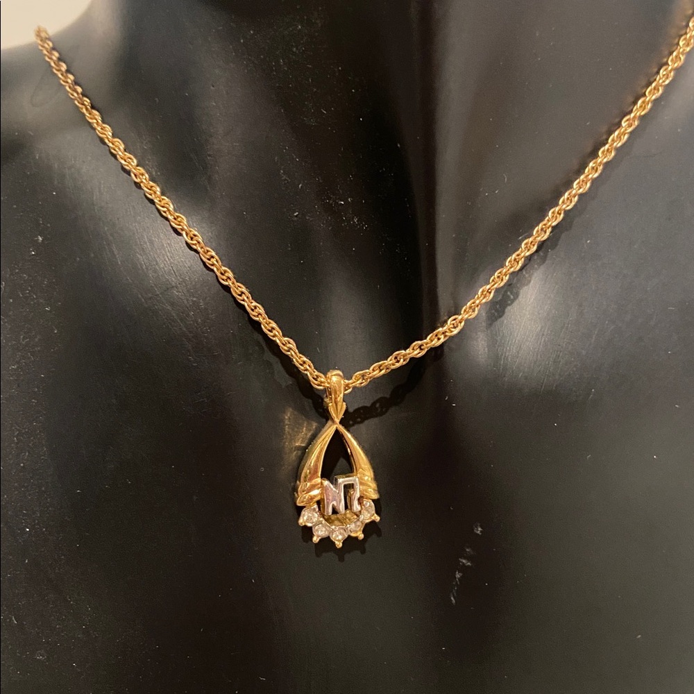 Nina Ricci NWOT Signature Pendant